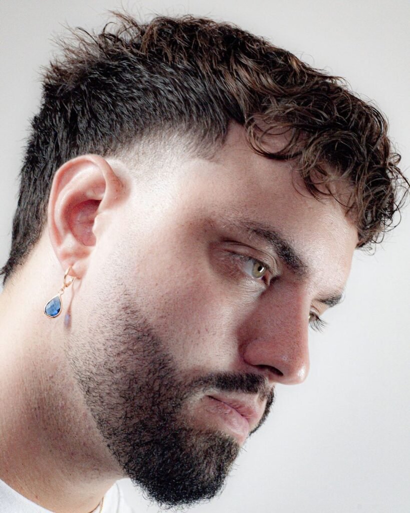 Taper with temple undercut for wavy hair
