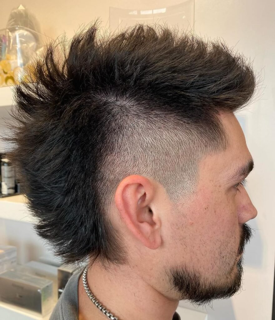 Men's spiky shaved mohawk