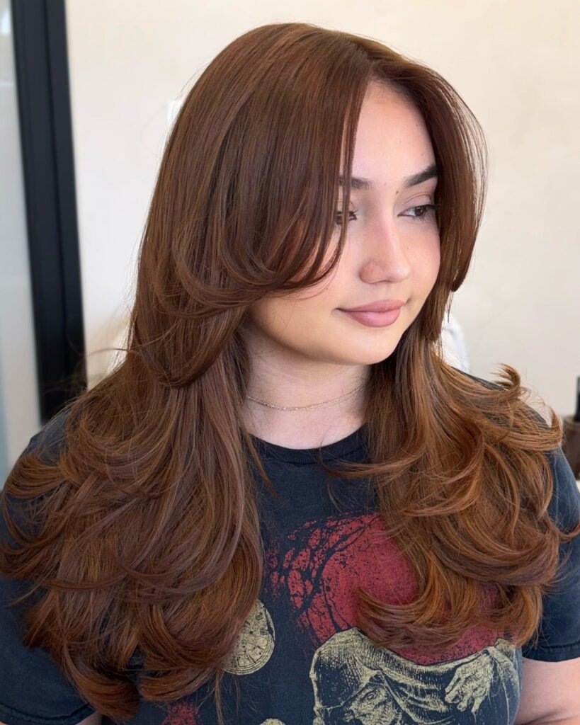 Feathered Honey Brown Layers with Face-Framing Bangs